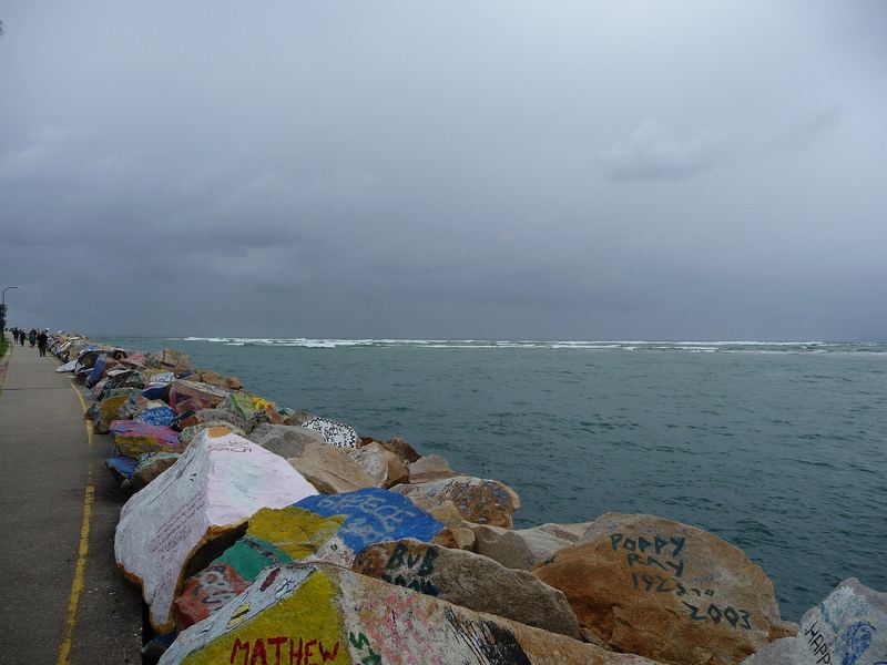 Painted rocks on the breakwall at Nambucca Heads
